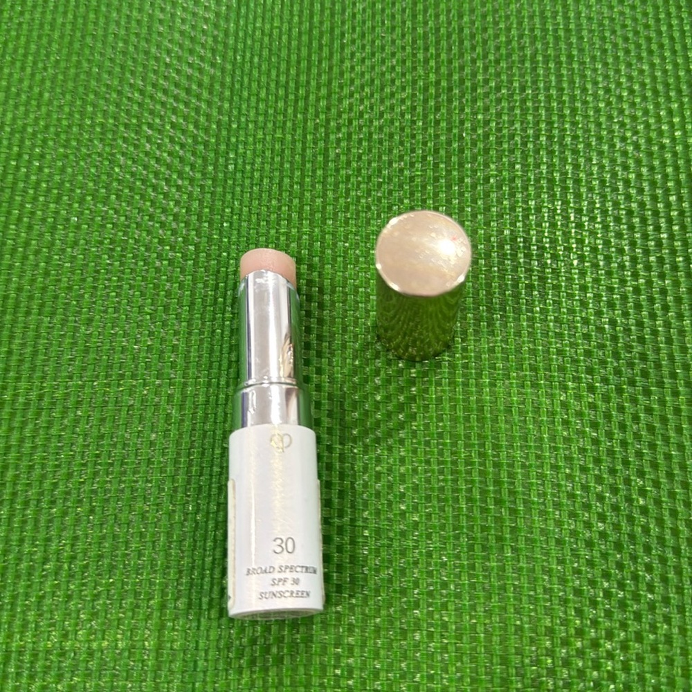 Cle de Peau lip balm 30 spf. Used.